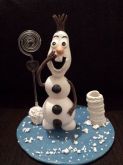 Olaf feito em biscuit com porta caneta e porta recados